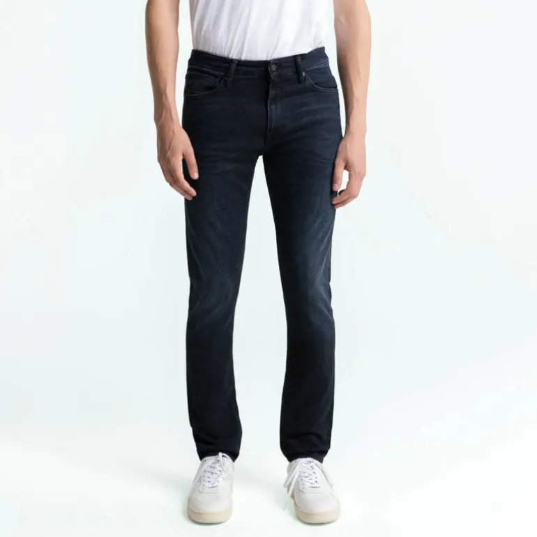 Kings Of Indigo John Slim Leg Jeans in Blue Black Worn