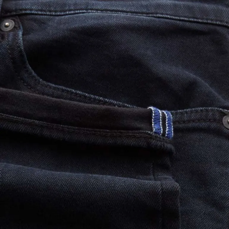 Kings Of Indigo John Slim Leg Jeans in Blue Black Worn