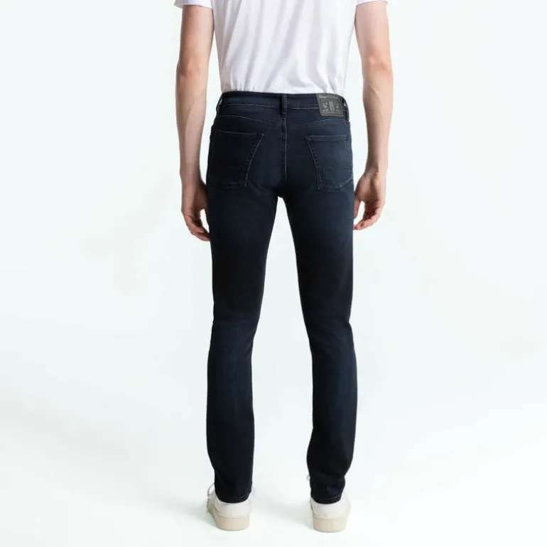 Kings Of Indigo John Slim Leg Jeans in Blue Black Worn