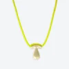 LA MOME BIJOU T Initial Joy Letter Necklace in Gold