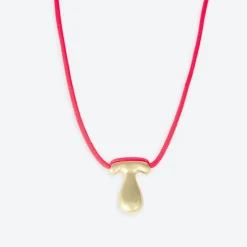 LA MOME BIJOU T Initial Joy Letter Necklace in Gold