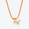 LA MOME BIJOU W Initial Joy Letter Necklace in Gold
