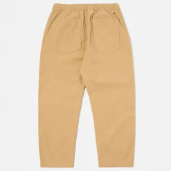 UNIVERSAL WORKS Hi Water Trousers in Dark Sand