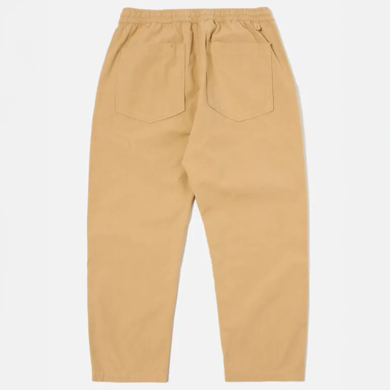 UNIVERSAL WORKS Hi Water Trousers in Dark Sand