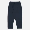 UNIVERSAL WORKS Pleated Track Pant in Navy
